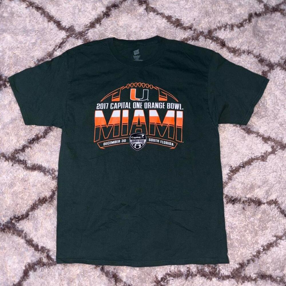 Dark green graphic tee featuring